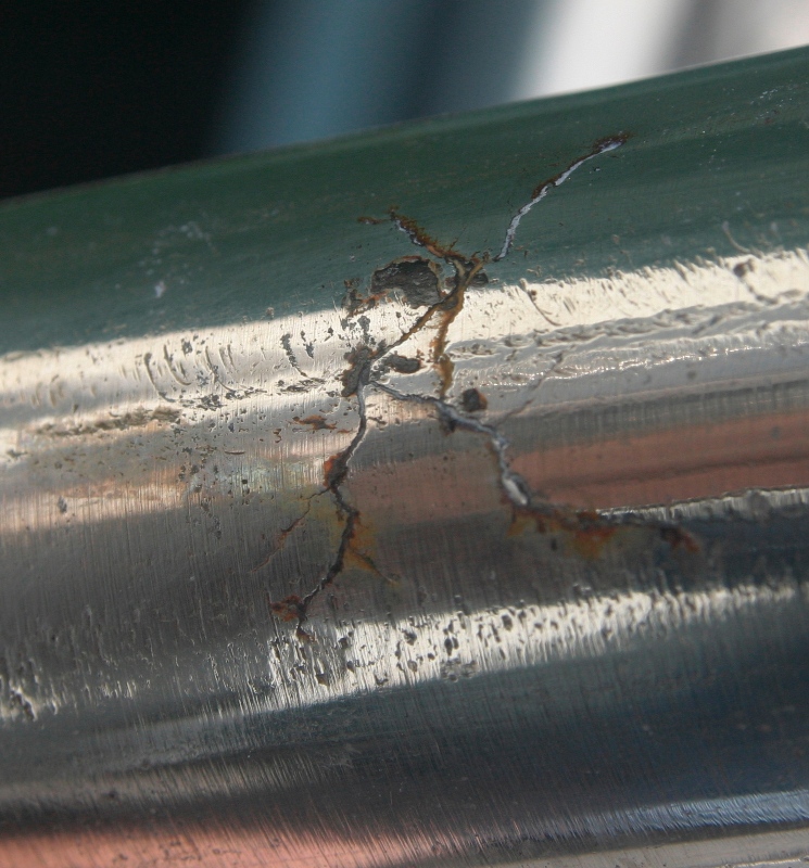 Crevice corrosion cracks in middle of stanchion